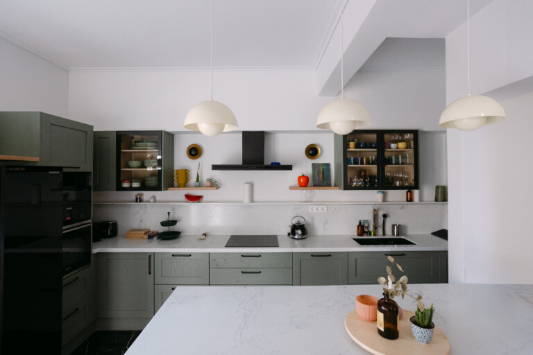 Fully equipped kitchen with island and pendant lights